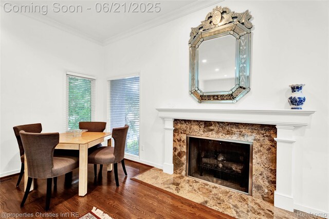 4768 Wendrick Dr, West Bloomfield, MI 48323 - dining room with wood finished floors, ornamental molding, and a premium fireplace