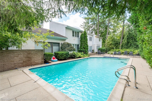 4768 Wendrick Dr, West Bloomfield, MI 48323 - outdoor pool with a patio