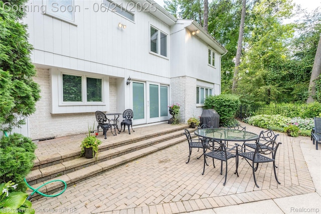 4768 Wendrick Dr, West Bloomfield, MI 48323 - view of patio featuring a grill and outdoor dining area