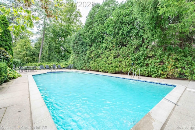 4768 Wendrick Dr, West Bloomfield, MI 48323 - outdoor pool featuring a patio
