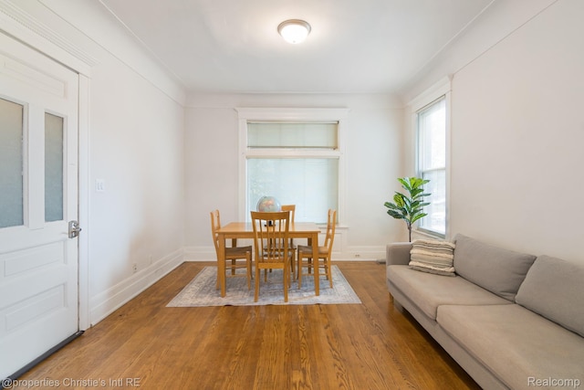 4751 Trumbull St, Detroit, MI 48208 - dining space featuring wood finished floors and baseboards