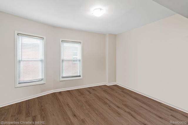 4751 Trumbull St, Detroit, MI 48208 - unfurnished room with dark wood-type flooring