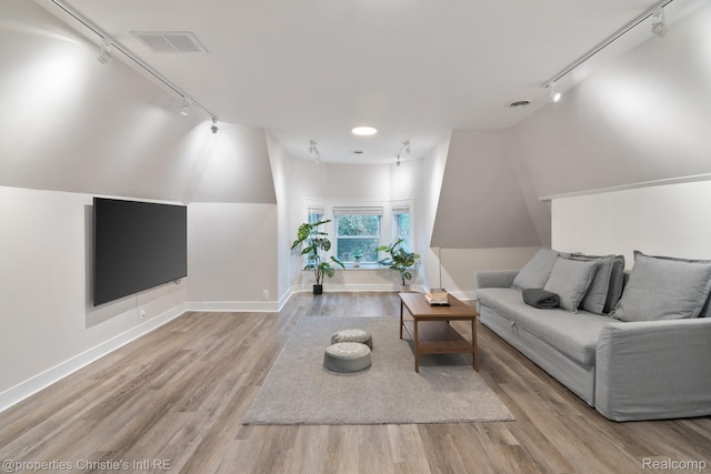 4751 Trumbull St, Detroit, MI 48208 - living area with rail lighting and wood finished floors
