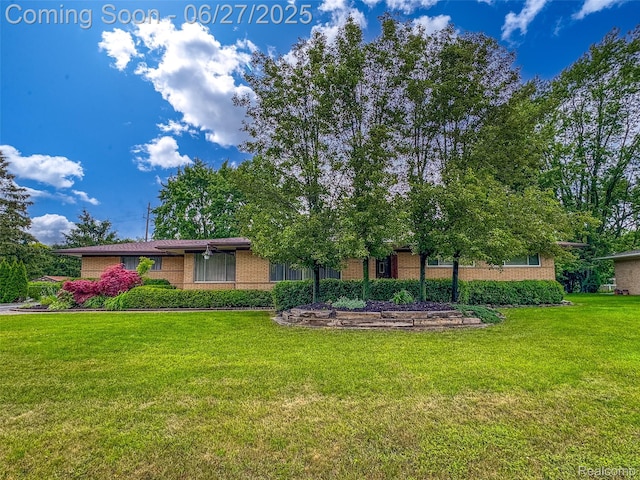 2558 Avonhurst Dr, Troy, MI 48084 - view of front of house with a front yard and brick siding