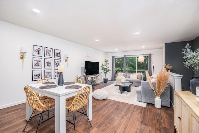 3342 Woodwind Dr NE, Grand Rapids, MI 49525 - dining area featuring dark wood-type flooring and recessed lighting