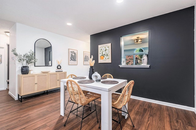 3342 Woodwind Dr NE, Grand Rapids, MI 49525 - dining space with dark wood-type flooring and recessed lighting