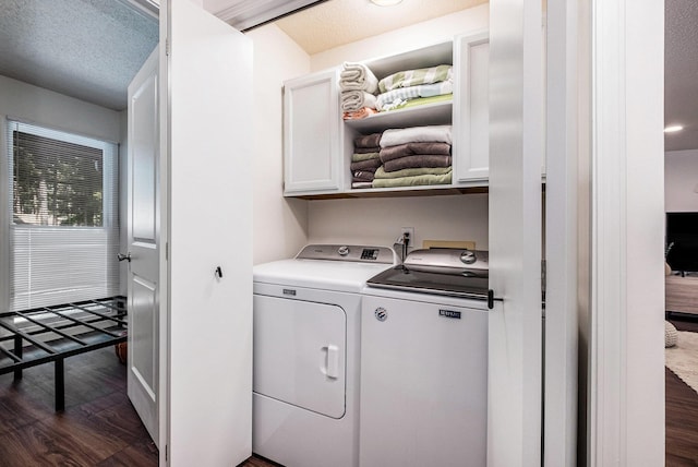 3342 Woodwind Dr NE, Grand Rapids, MI 49525 - washroom with cabinet space, washer and dryer, and dark wood-style flooring