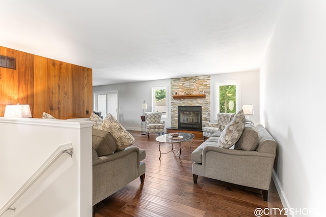 3905 Sunset Vw, Wayland, MI 49348 - living room with a stone fireplace and dark wood-type flooring