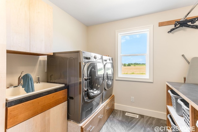 3905 Sunset Vw, Wayland, MI 49348 - laundry room featuring washing machine and clothes dryer and cabinet space