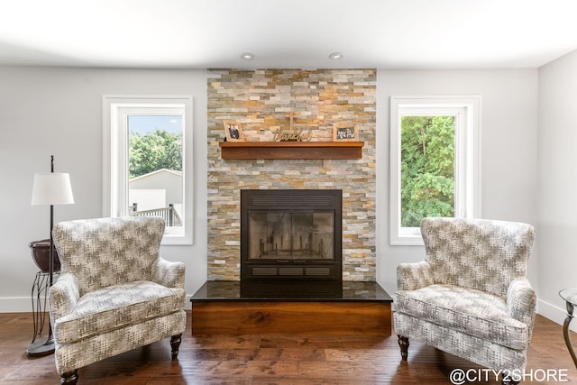 3905 Sunset Vw, Wayland, MI 49348 - sitting room featuring a fireplace, wood finished floors, and recessed lighting