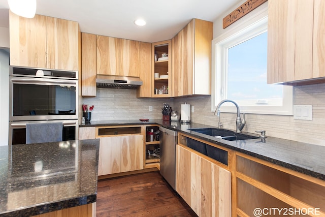 3905 Sunset Vw, Wayland, MI 49348 - kitchen featuring stainless steel appliances, light brown cabinetry, dark stone countertops, and recessed lighting