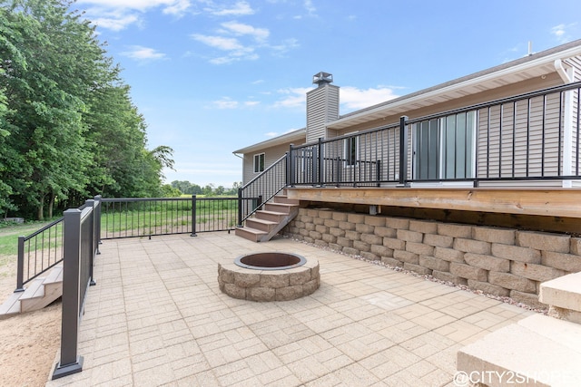 3905 Sunset Vw, Wayland, MI 49348 - view of patio with an outdoor fire pit, stairs, and a deck
