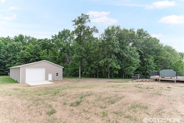 3905 Sunset Vw, Wayland, MI 49348 - view of yard with a detached garage, a deck, and an outbuilding