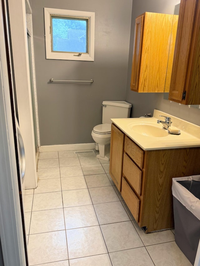 423 E Prairie St, Vicksburg, MI 49097 - full bathroom featuring vanity, tile patterned flooring, and a stall shower