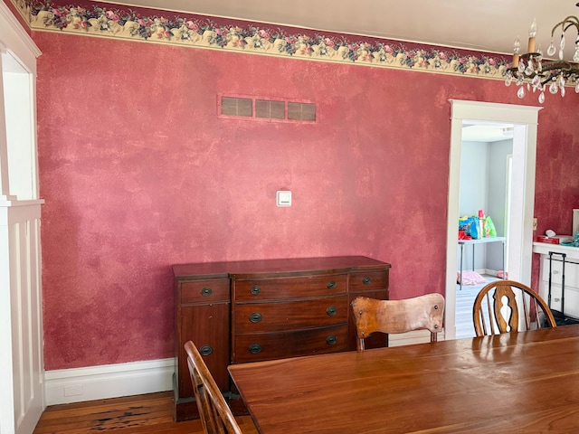 423 E Prairie St, Vicksburg, MI 49097 - dining room with wood finished floors and a chandelier