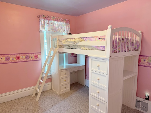 423 E Prairie St, Vicksburg, MI 49097 - bedroom featuring light colored carpet