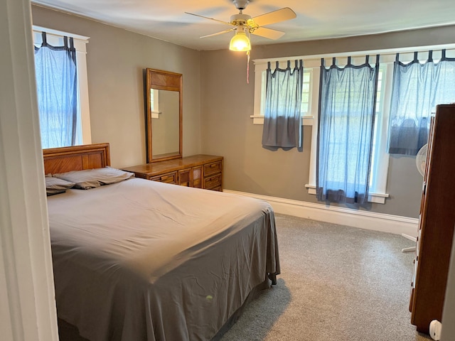 423 E Prairie St, Vicksburg, MI 49097 - carpeted bedroom featuring ceiling fan and baseboards
