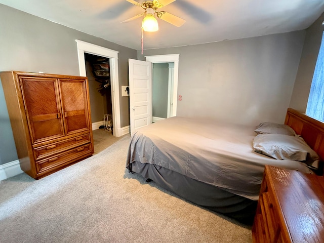 423 E Prairie St, Vicksburg, MI 49097 - carpeted bedroom featuring a walk in closet, a closet, and ceiling fan