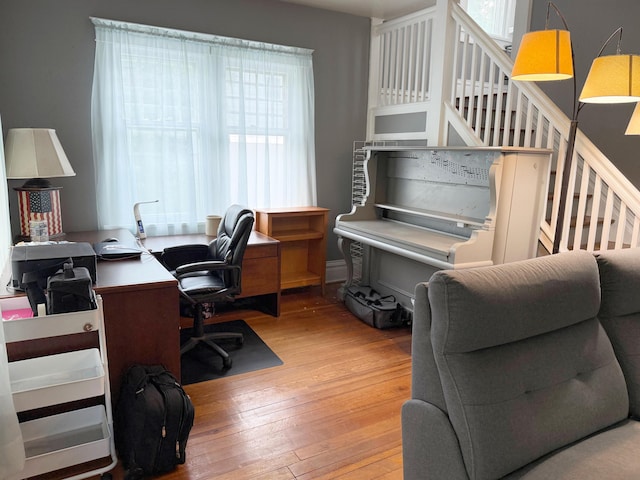 423 E Prairie St, Vicksburg, MI 49097 - home office featuring wood-type flooring and healthy amount of natural light