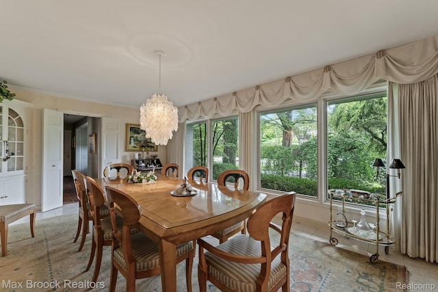 130 Endicott Rd, Bloomfield Hills, MI 48304 - dining space with a chandelier, healthy amount of natural light, and light tile patterned flooring