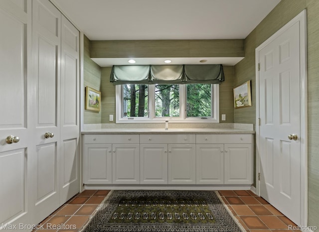 130 Endicott Rd, Bloomfield Hills, MI 48304 - kitchen with dark tile patterned flooring, white cabinetry, light countertops, and recessed lighting
