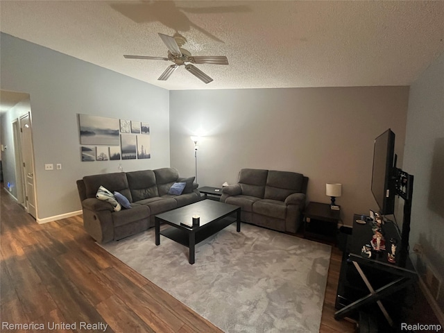 35754 Castlewood Ct, Westland, MI 48185 - living room featuring wood finished floors, a textured ceiling, a ceiling fan, and vaulted ceiling