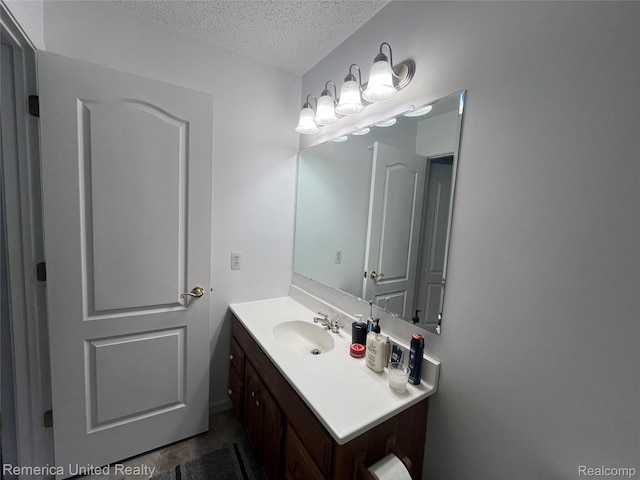 35754 Castlewood Ct, Westland, MI 48185 - bathroom with a textured ceiling and vanity