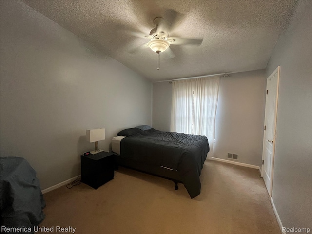 35754 Castlewood Ct, Westland, MI 48185 - carpeted bedroom with a textured ceiling and a ceiling fan