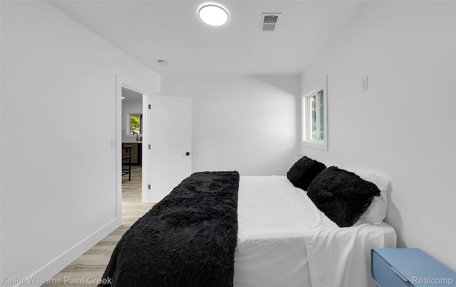 1641 Silman St, Ferndale, MI 48220 - bedroom featuring light wood-style flooring and baseboards