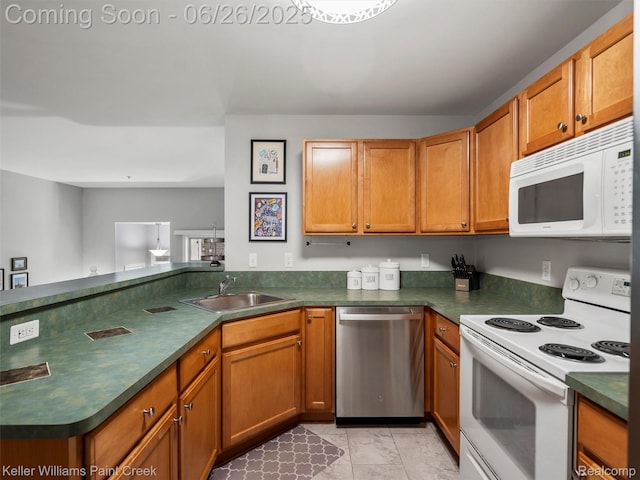 3991 Forester Blvd, Auburn Hills, MI 48326 - kitchen featuring white appliances, dark countertops, and brown cabinets