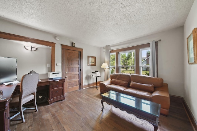 1302 Lansing Ave, Jackson, MI 49202 - office space with wood-type flooring and a textured ceiling