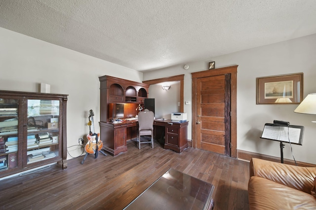 1302 Lansing Ave, Jackson, MI 49202 - office space with dark wood finished floors and a textured ceiling