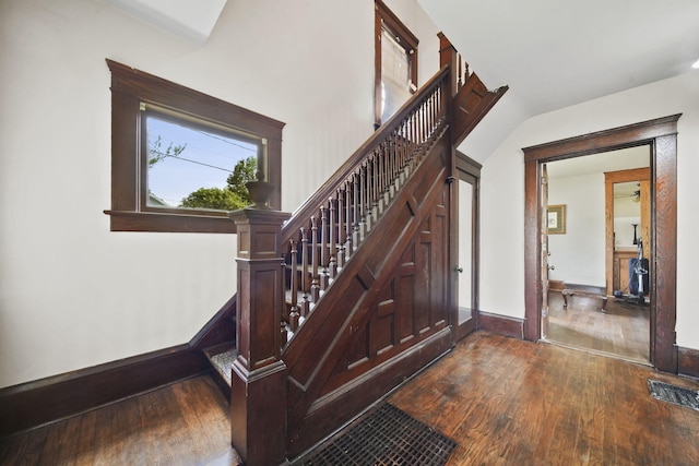 1302 Lansing Ave, Jackson, MI 49202 - stairway with hardwood / wood-style floors and baseboards