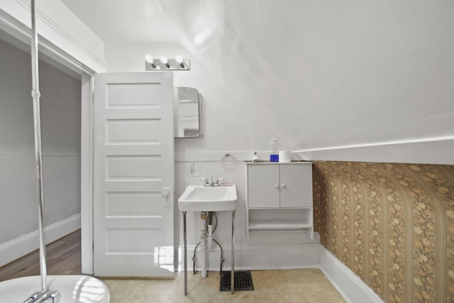 1302 Lansing Ave, Jackson, MI 49202 - bathroom featuring baseboards