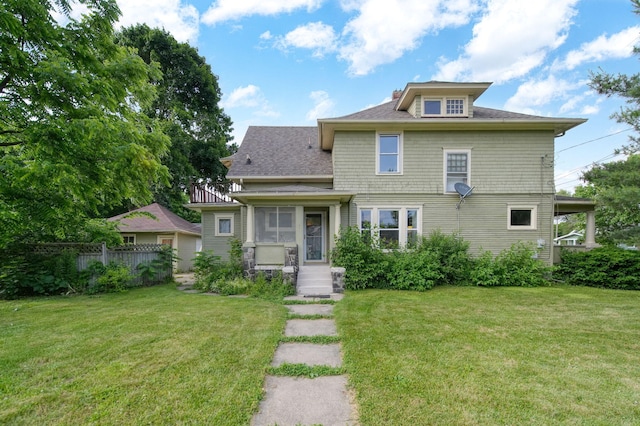 1302 Lansing Ave, Jackson, MI 49202 - american foursquare style home with a sunroom, a chimney, and a shingled roof