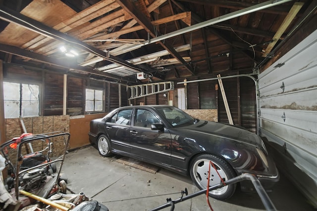 1302 Lansing Ave, Jackson, MI 49202 - garage featuring a garage door opener