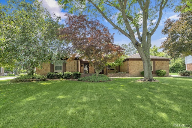 366 Tara Dr, Troy, MI 48085 - view of front facade featuring a front yard and brick siding
