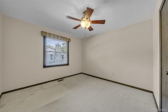 366 Tara Dr, Troy, MI 48085 - empty room with light colored carpet and a ceiling fan