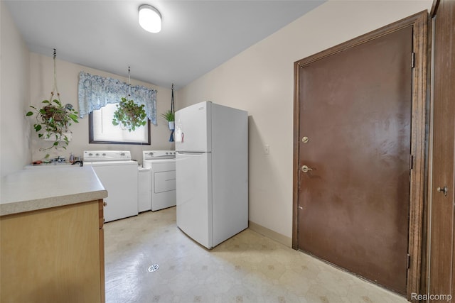 366 Tara Dr, Troy, MI 48085 - laundry room featuring light floors and separate washer and dryer