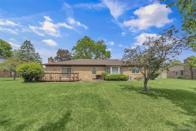 366 Tara Dr, Troy, MI 48085 - view of front facade featuring brick siding, a front yard, a wooden deck, and a chimney
