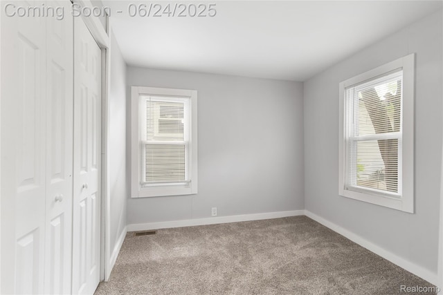2814 Crooks Rd, Royal Oak, MI 48073 - unfurnished bedroom featuring carpet floors and a closet