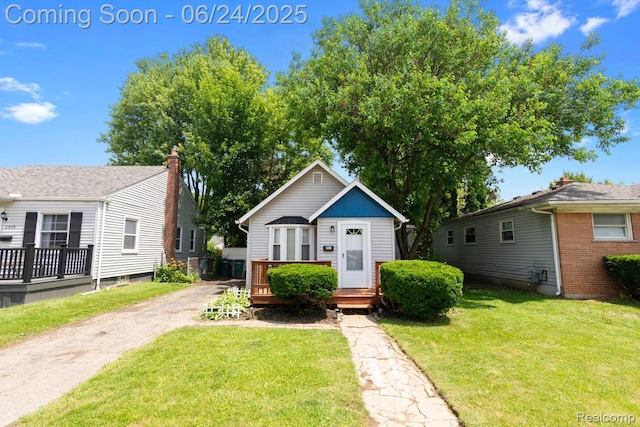 2814 Crooks Rd, Royal Oak, MI 48073 - bungalow-style home with a front lawn and a wooden deck