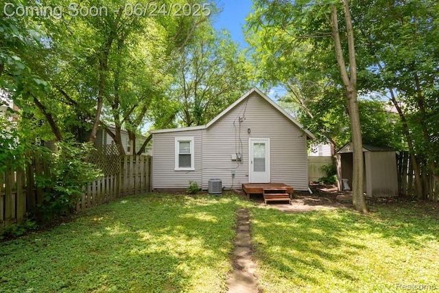 2814 Crooks Rd, Royal Oak, MI 48073 - rear view of property with a fenced backyard and a shed