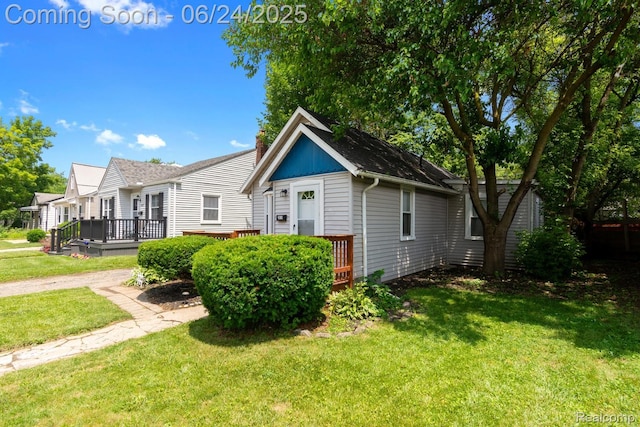 2814 Crooks Rd, Royal Oak, MI 48073 - view of front of house with a deck and a front yard