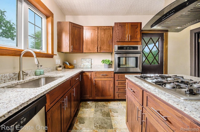 22500 Boulder Ave, Eastpointe, MI 48021 - kitchen with appliances with stainless steel finishes, extractor fan, light stone countertops, light stone finish floors, and a textured ceiling