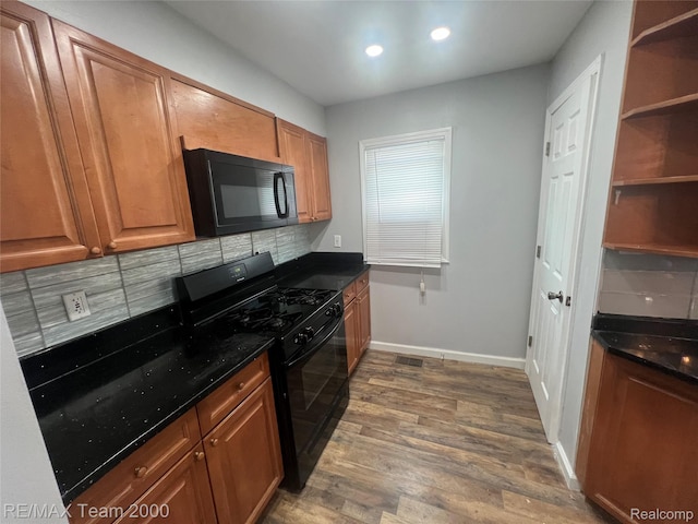 4064 Moore St, Inkster, MI 48141 - kitchen featuring black appliances, tasteful backsplash, dark wood-type flooring, recessed lighting, and brown cabinets
