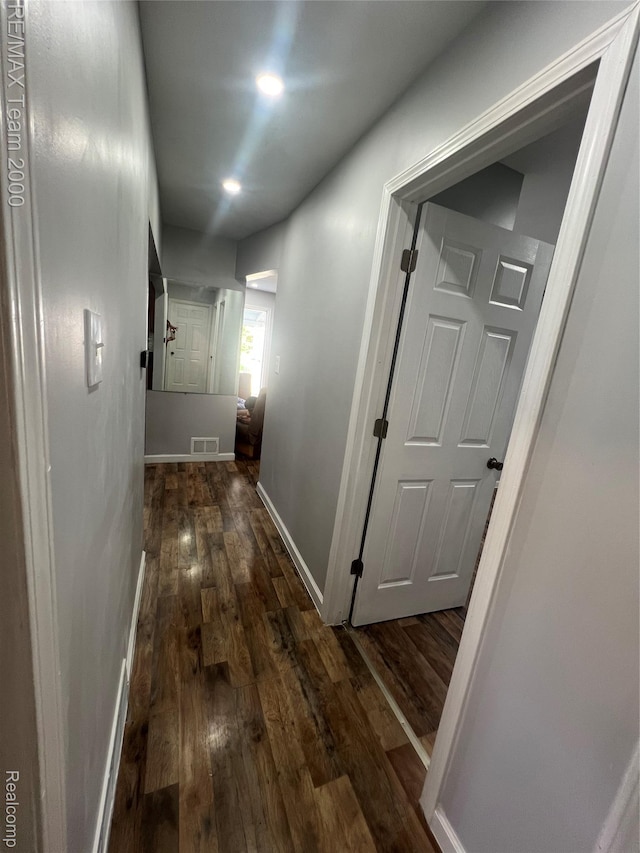 4064 Moore St, Inkster, MI 48141 - corridor with dark wood-style floors and baseboards