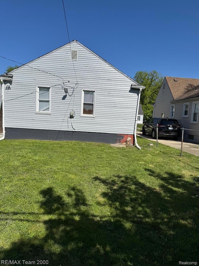 4064 Moore St, Inkster, MI 48141 - view of property exterior featuring a lawn