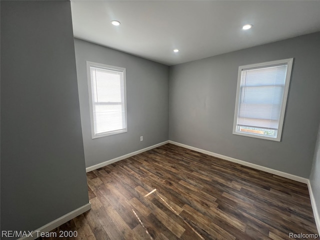 4064 Moore St, Inkster, MI 48141 - spare room with dark wood-style floors and recessed lighting