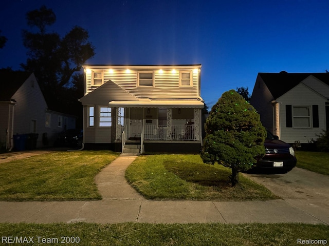 4064 Moore St, Inkster, MI 48141 - traditional-style home with covered porch and a front yard